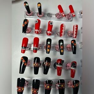 Sami’s Manis floral with some spice presson nails